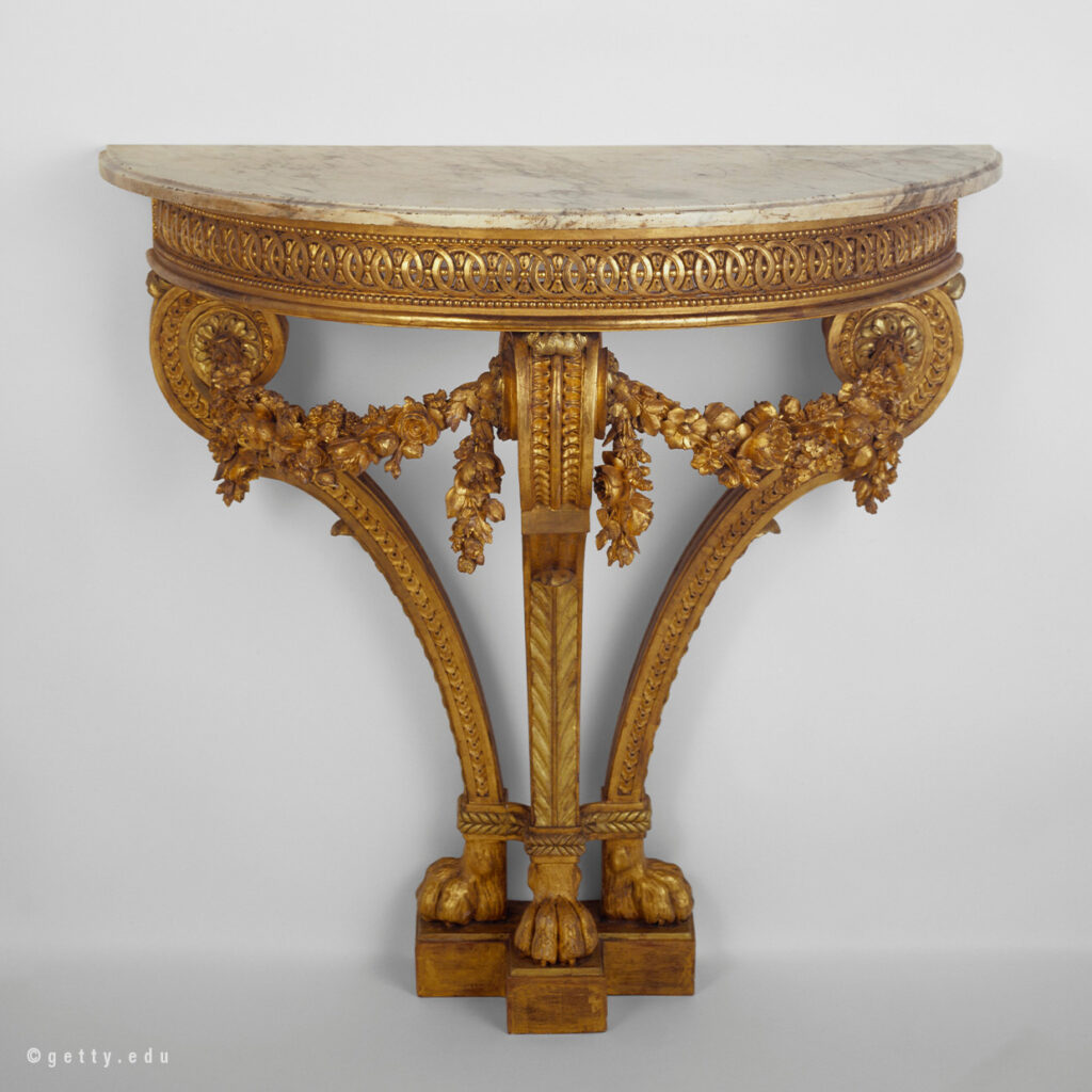 Console en bois sculpté, doré, dessus en marbre D'après un dessin de l'architecte Richard de Lalond (actif 1780-1790).